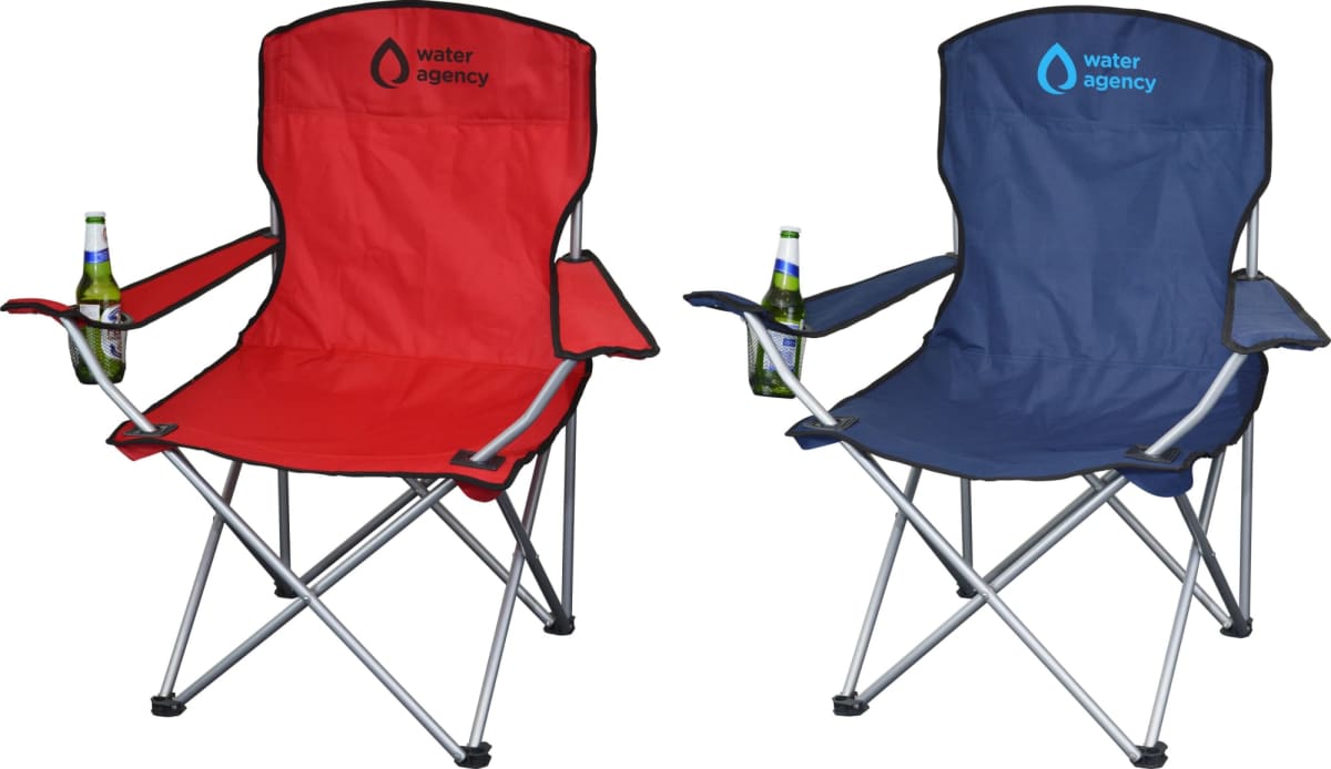 Two foldable camping chairs, one red and one blue, each with a water agency logo and a bottle holder containing a bottle. The chairs are designed with armrests and are on a white background.
