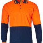 A long-sleeve, two-tone polo shirt featuring a bright orange upper half and a navy blue lower half. It has a collar with stripes, a front pocket, and buttons at the neck.