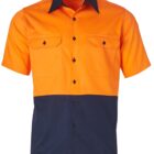 A short-sleeve work shirt with two-tone colors: bright orange on the top half and dark navy blue on the bottom half. It features two chest pockets with buttoned flaps and a button-down front closure.