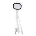 A white multi-port charging cable with four connectors: USB-C, Micro USB, and two Lightning. The cable is attached to a small, rectangular device with a black border and a mirror-like surface.