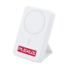 White wireless charging stand with PLEXUS logo in red at the bottom, seen at an angle.