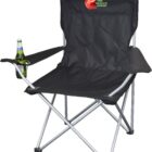 A black folding camping chair with a green beer bottle in the left cup holder. The chair has a logo of a red apple and the words The Health Group on the backrest. The chair has a lightweight metal frame.