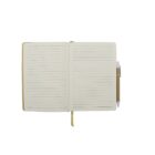 Open notebook with lined pages and a beige cover, centered on a white background. A pen is clipped to the notebooks side. A ribbon marker lies across the pages.