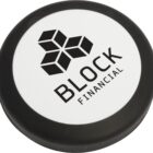 A round, flat, black and white object with the logo BLOCK Financial printed on top. The logo features three interconnected cubes above the text.
