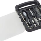 A compact black tool kit with an open case showing a screwdriver with interchangeable bits, a pair of pliers, and other small hand tools. The kit is neatly organized and includes a white plastic cover.