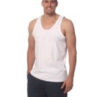 A man in a white tank top and dark shorts smiles, standing with a relaxed posture against a plain white background.