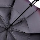Close-up view of an open black umbrella, focusing on the interior structure, including the metal ribs and central shaft. The handle is visible at the top of the image.