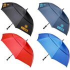 Four open umbrellas are displayed against a white background. The umbrellas are black, blue, red, and light blue. The black and blue umbrellas have VORTEX written on them along with a spiral logo. Each umbrella has a black handle.