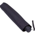 A closed black umbrella with a cylindrical handle, partially covered by a matching protective sleeve. A small strap is attached to the handle for easy carrying.
