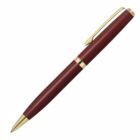 A sleek, burgundy ballpoint pen with gold accents on the clip, middle band, and tip.