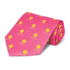 A rolled-up pink tie featuring a repeating yellow graphic of a baseball and bat, with cursive text beneath each graphic.