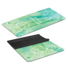 Two yoga mats with a green watercolor background and white mandala patterns. One mat is labeled YOGA STUDIO and is fully visible, while the other is partially rolled up, showing a black underside.