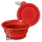 Collapsible red silicone pet bowl with a metal carabiner attached. The image shows both the opened and flattened views of the bowl.