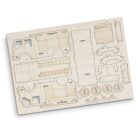 A wooden model kit with laser-cut pieces displayed flat. The pieces include parts of a vehicle, such as wheels, a ladder, and body panels, ready for assembly.
