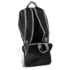 A black backpack with gray mesh shoulder straps and a top handle. The main compartment and a front pocket are open, displaying green zipper linings. The bag is standing upright on a white background.