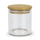 A clear glass jar with a smooth bamboo lid. The lid fits snugly on top, and the jar is cylindrical with a plain, modern design. The jar is empty and placed against a white background.
