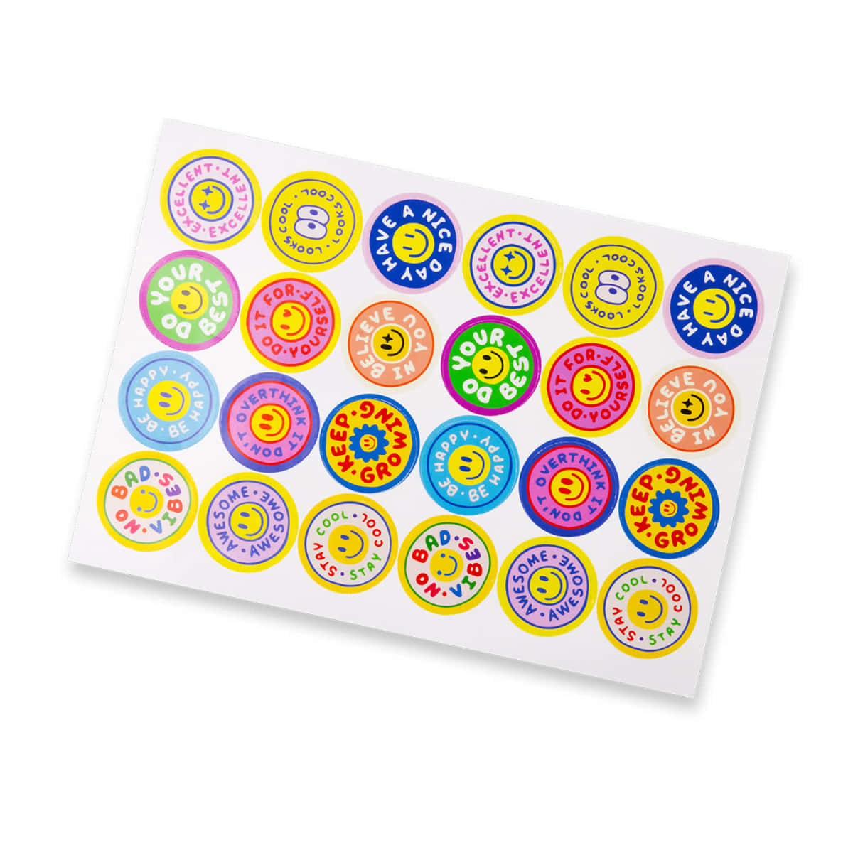 A sheet of colorful round stickers, each with smiley faces and positive messages like Have a nice day, Youre awesome, and Keep smiling, in various bright colors such as yellow, blue, pink, and green.