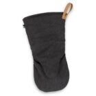 A black oven mitt with a small tan hanging loop at the top corner.