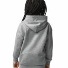 Child with braided hair wearing a gray hoodie and blue jeans, shown from the back.