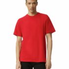 A person wearing a plain red T-shirt and black pants is standing against a white background. They have braided hair and a neutral expression.