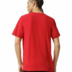A person with braided hair is standing with their back to the camera, wearing a plain red T-shirt and black pants.