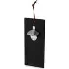 Wall-mounted metal bottle opener on a black rectangular board with a leather hanging loop.