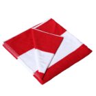 Red and white checkered towel neatly folded on a white background.