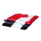Two folded towels with red, white, and black geometric patterns stacked on each other.