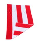 A towel with bold red and white vertical stripes, corner folded to show underside.