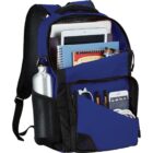Blue backpack with open compartments, showing books, tablet, water bottle, and stationery.