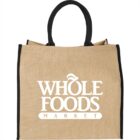 Beige tote bag with Whole Foods Market logo in white.