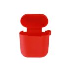 Red earphone case with an open lid, isolated on a white background.