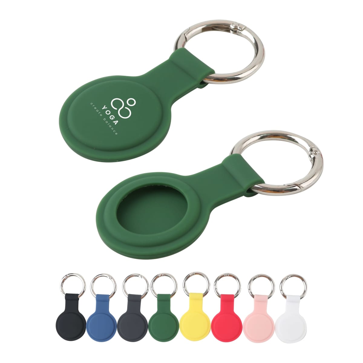 Green and various colored round keychains with metal rings, one with YOGA printed on it.