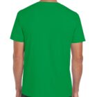A person wearing a plain green T-shirt stands with their back to the camera. They are also wearing dark jeans. The background is neutral.