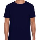A person wearing a plain dark blue T-shirt stands against a white background. The T-shirt has a simple, classic crew neck design, and the person is smiling, with visible arms hanging loosely by their sides.