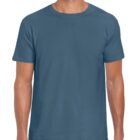 A person wearing a plain blue T-shirt stands against a white background. The T-shirt is short-sleeved and fits comfortably. The individual has their arms relaxed at their sides.