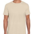 A person wearing a plain, light beige T-shirt and dark pants stands against a white background. The T-shirt is short-sleeved with a crew neckline, and the individuals face is not visible.