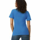 Woman with curly hair wearing a blue t-shirt and jeans, shown from the back.