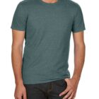 A person wearing a plain teal T-shirt and dark jeans standing casually with one hand in their pocket against a white background. The persons face is not visible.