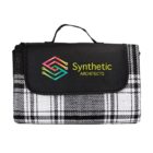 Plaid blanket with Synthetic Architects logo on the flap.