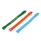 Three colored USB bracelets, green, orange, and blue, with white text and logos.