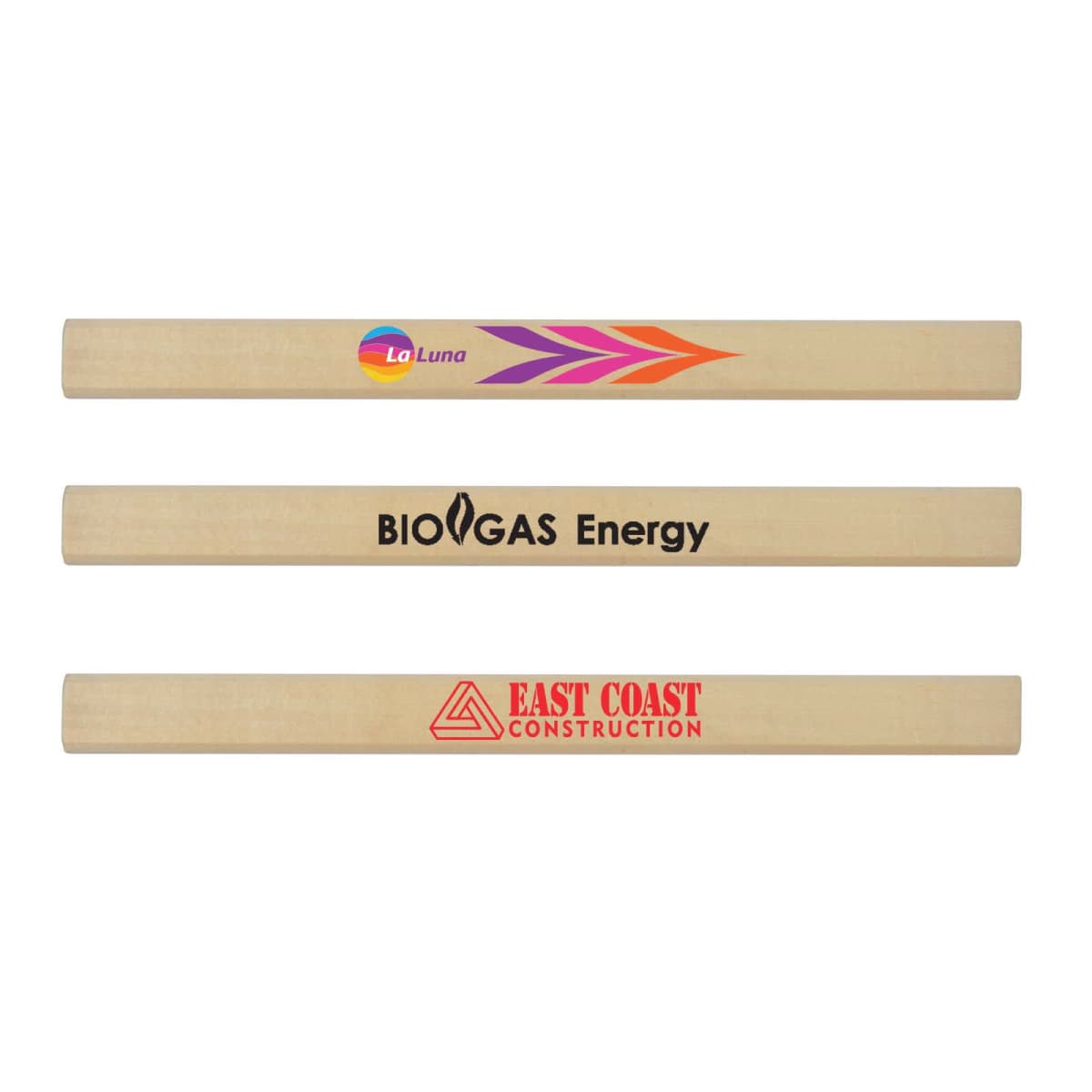 Three wooden carpenter pencils are displayed horizontally. The top pencil has a colorful leaf logo and La Luna text, the middle pencil reads BIOGAS Energy in black, and the bottom pencil shows EAST COAST CONSTRUCTION in red with a triangle logo.