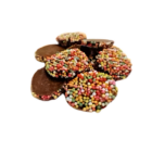 A heap of Allens Freckles Bags chocolate discs adorned with vibrant, round candy sprinkles on a white background.