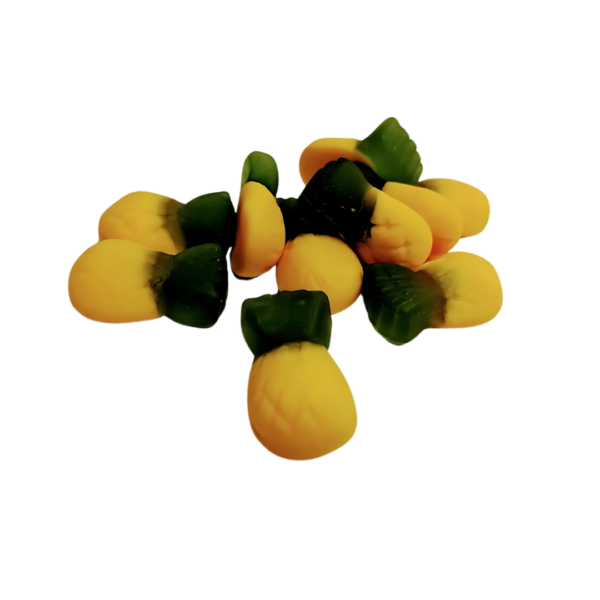 A delightful pile of Allens Pineapples gummies displays vibrantly yellow fruit with green tops, all set against a crisp white background.