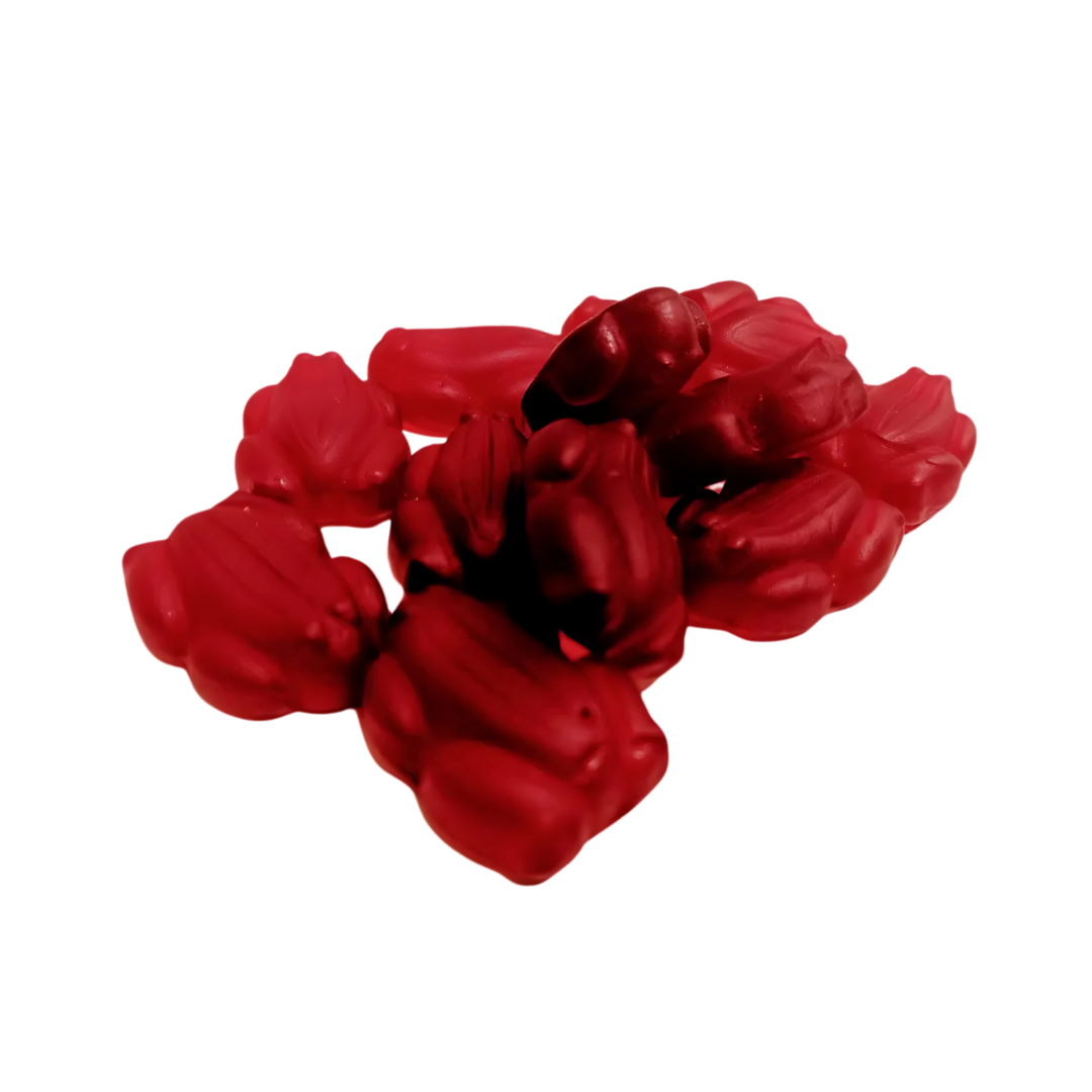 Allens Red Frogs gummy candies are arranged in a pile on a white background, each shaped like a fish.