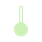 Green silicone pan with a long handle, isolated on a white background.