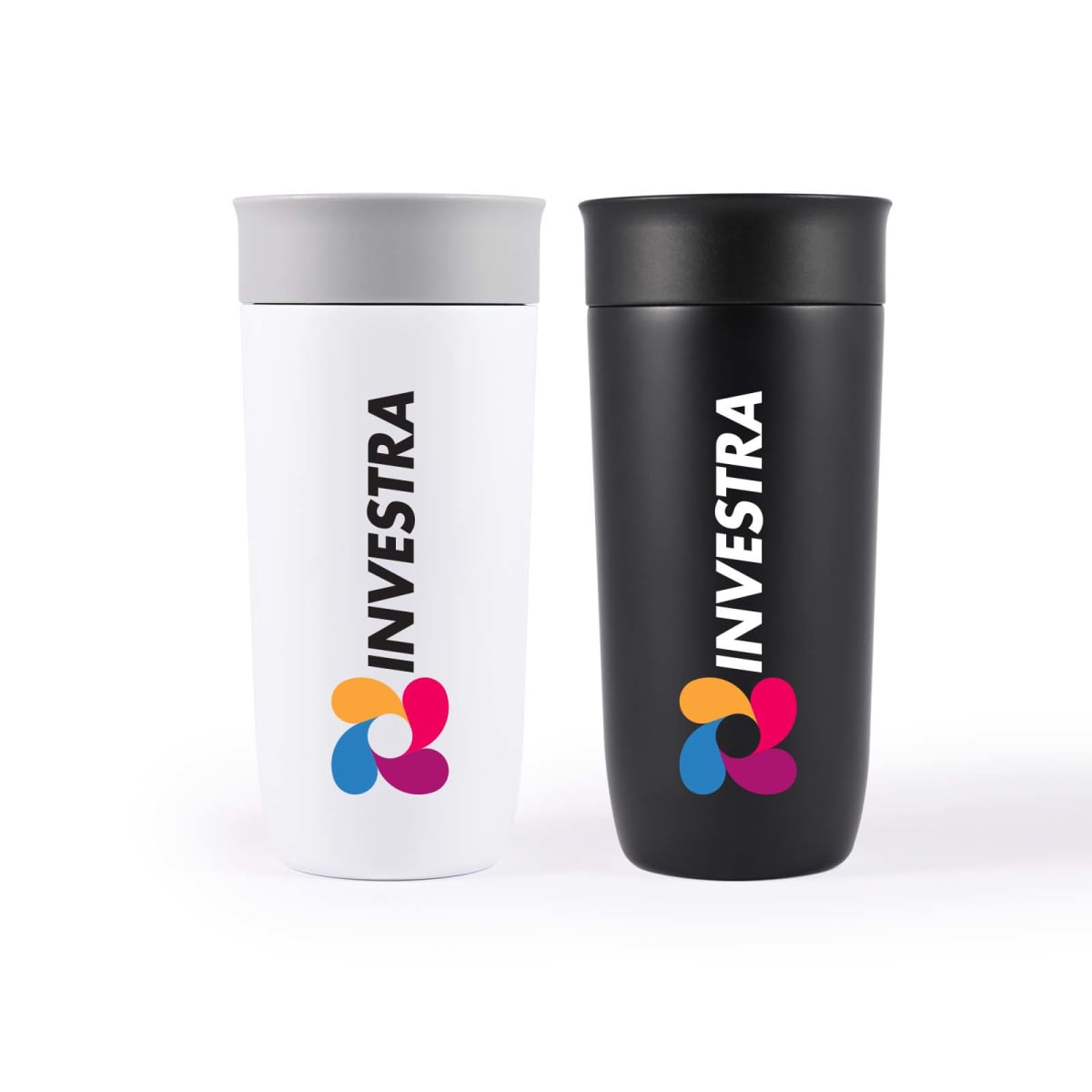 Two travel mugs with the brand name INVESTRA printed vertically. One mug is white with a gray lid, and the other is black. Both feature a colorful logo with overlapping shapes in pink, orange, blue, and purple at the base of the text.