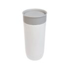 A sleek, white travel mug with a smooth, cylindrical shape and a gray lid. It has a minimalist design, suitable for carrying hot or cold beverages. The lid is flat and fits securely on top. The background is plain white.
