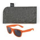 Orange sunglasses with dark lenses are placed below a gray felt case. A black tag on the case reads used to be a plastic bottle.