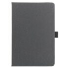 A plain, closed, dark grey notebook with a black elastic band on the right side against a white background.